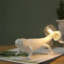 Modern and playful chameleon lizard desk lamp in resin