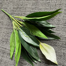 Tropical artificial monstera and anthurium plants for indoor decoration