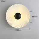 Nordic round metal LED wall light for modern interiors