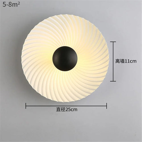 Nordic round metal LED wall light for modern interiors