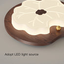 Modern chandelier with creative tree leaf design and wood effect