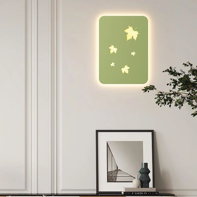 Dimmable metal wall light with maple leaves