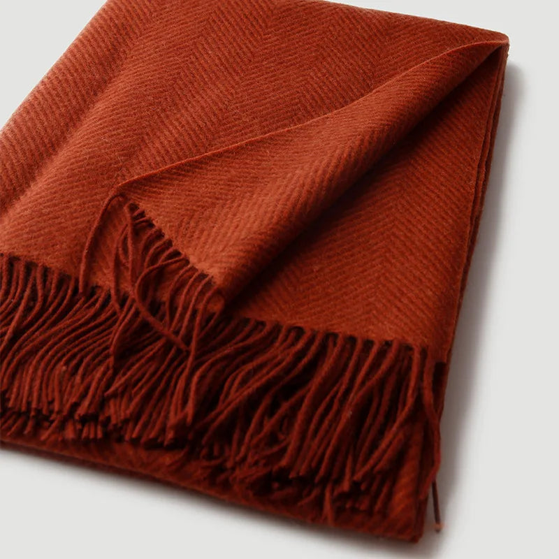 Soft wool throw with twill stripes and tassels for travel and home