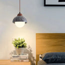 Modern marble and wood pendant light for bar