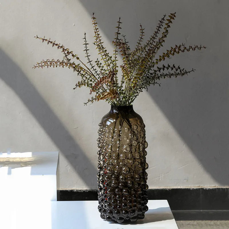 clear glass vase with black dots for decoration and floral arrangements