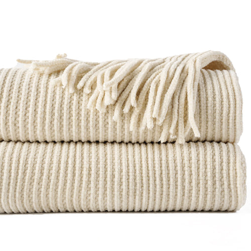 Chenille knit throw with pompoms and checked pattern decor