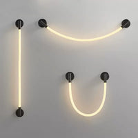 Minimalist LED wall light in flexible woven silicone fibre