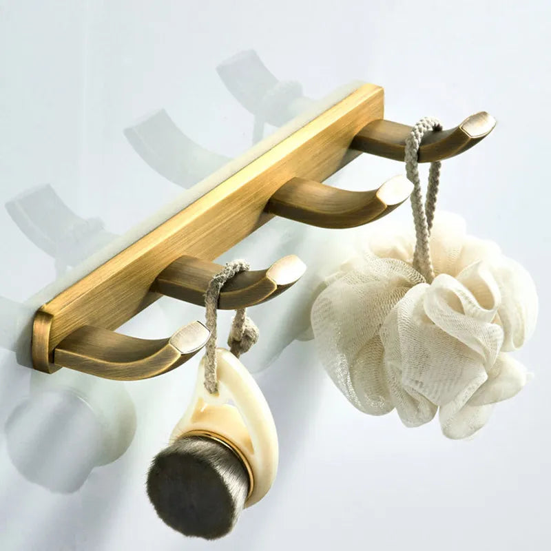 bronze shelf with hooks for versatile storage