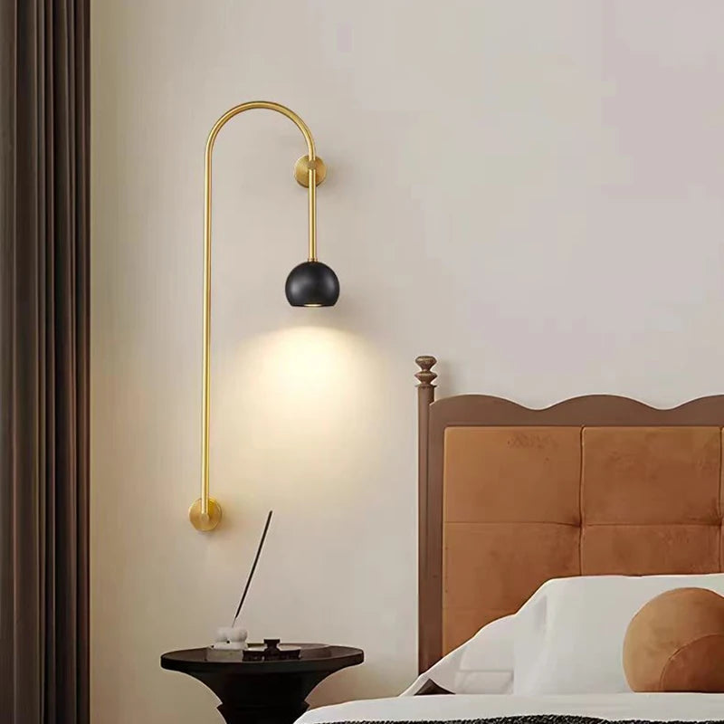 Minimalist copper and brass wall light