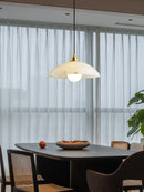 Minimalist marble and copper pendant light for modern interiors