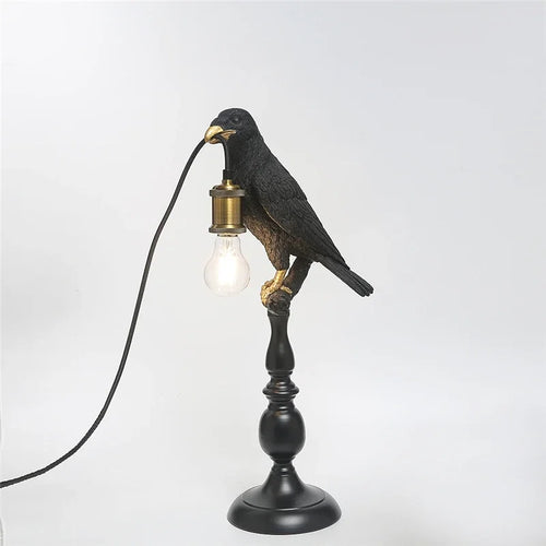 Modern resin bird-shaped desk lamp with golden beak - vue 2 sur 7