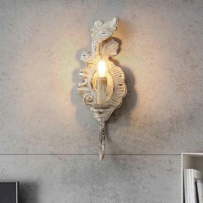 Vintage wall light in aged iron and wood for indoor decoration