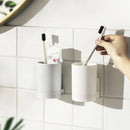 Wall-mounted organiser for toothbrushes and cup