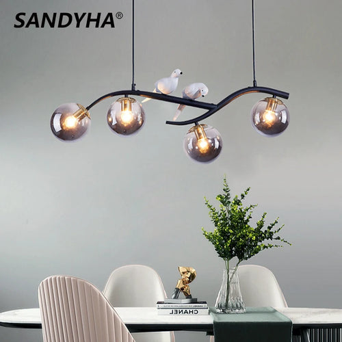 Iron chandelier with bird and suspended glass ball - vue 2 sur 12
