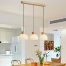 Modern pendant light with glass shade for kitchen island