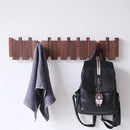 hanging walnut coat rack with creative solid wood hooks