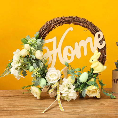 Decorative Easter wreath with bunny and hanging eggs