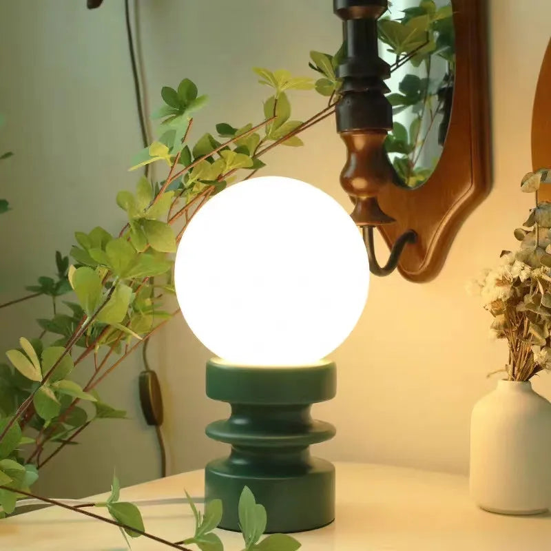 Designer glass table lamp for a warm atmosphere