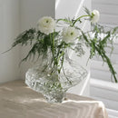 glass vase with decorative stones for flowers and terrarium