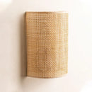 Southeast Asian style rattan wall light with minimalist switch