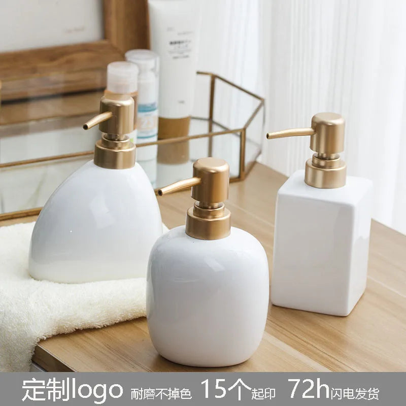 ceramic soap dispenser with gold pump for bathroom