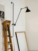 Industrial wall light with adjustable arm for modern interiors