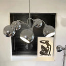 Nordic chrome chandelier with decorative globe lamps