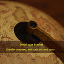 LED desk lamp with decorative rotating globe