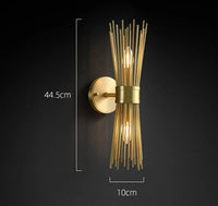 Luxury designer wall light in antique metal for an elegant interior