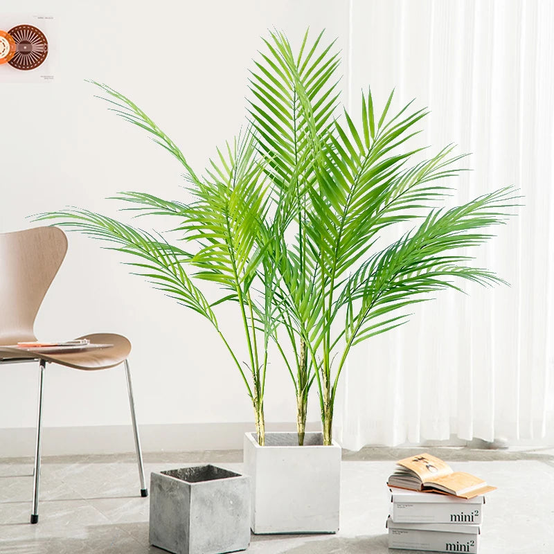 Artificial monstera palm tree and fern for indoor and outdoor decor