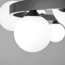 Modern brass ring pendant with white glass