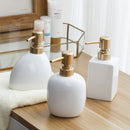 ceramic soap dispenser with gold pump for bathroom