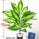 Large artificial tropical plant with leaves for indoor decoration