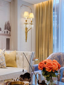 Copper and crystal wall light with LED candle for elegant interiors