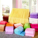 Soft warm coral fleece flannel throw for sofa or bed