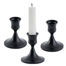 Set of three gold brass candle holders for weddings and dinners