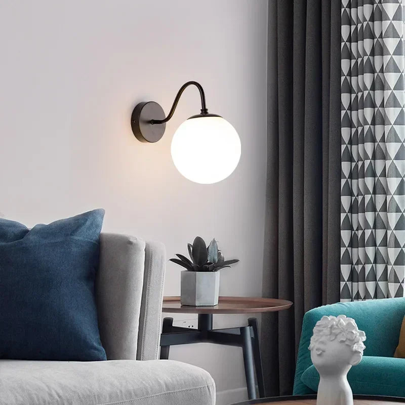 Modern glass wall lamp with elegant luminous globe