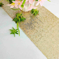 Orange sequin table runner for weddings and parties