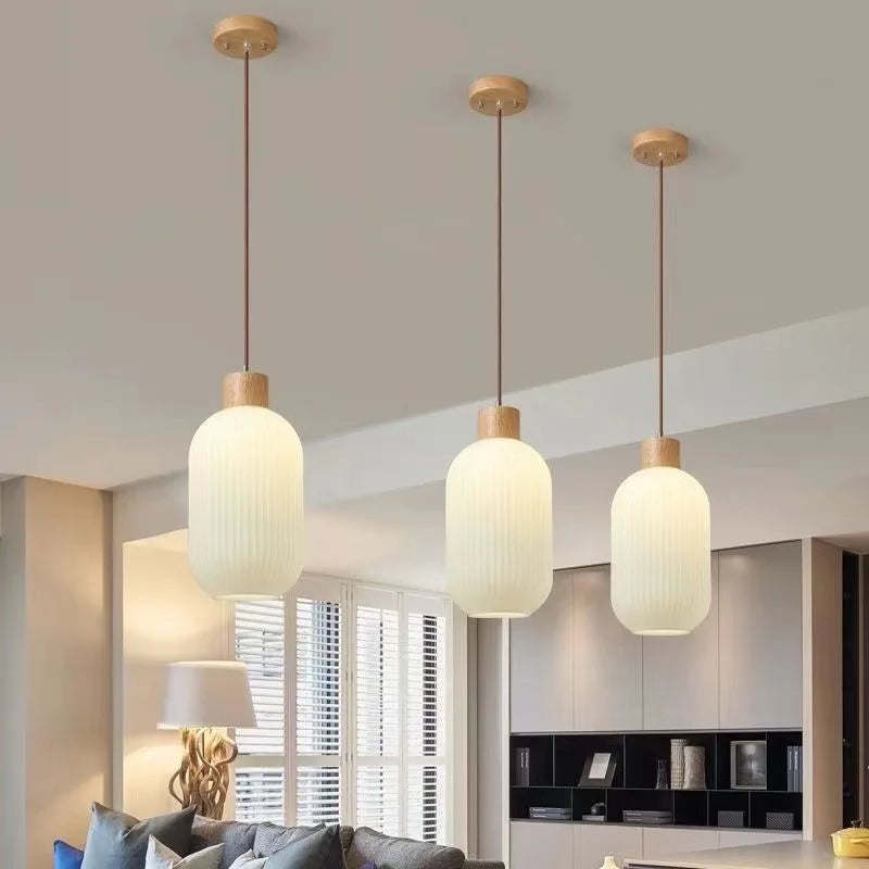 Glass pendant light with Nordic wood detail