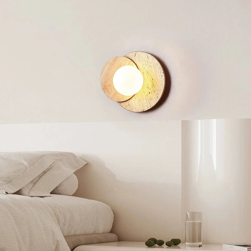 Round stone-style LED wall lamp in cream