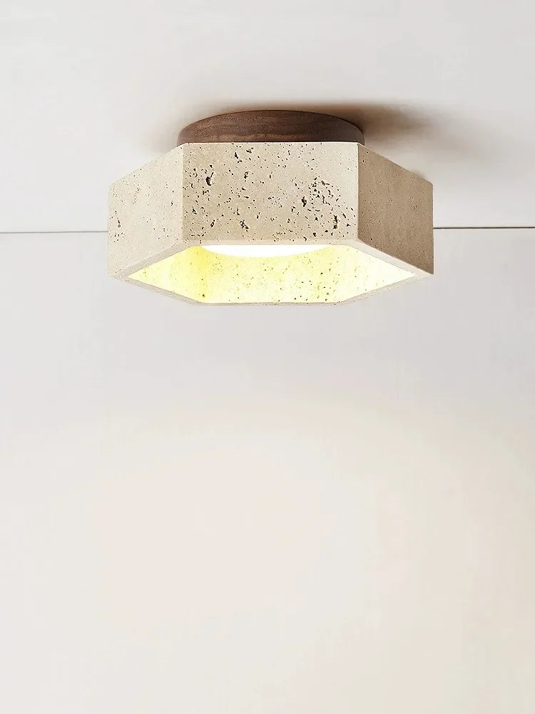 Modern travertine LED ceiling light for an elegant interior