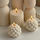 silicone candle mold in the shape of a cylindrical ball and bubble