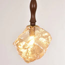 Amber glass ice block style chandeliers for restaurant and bar