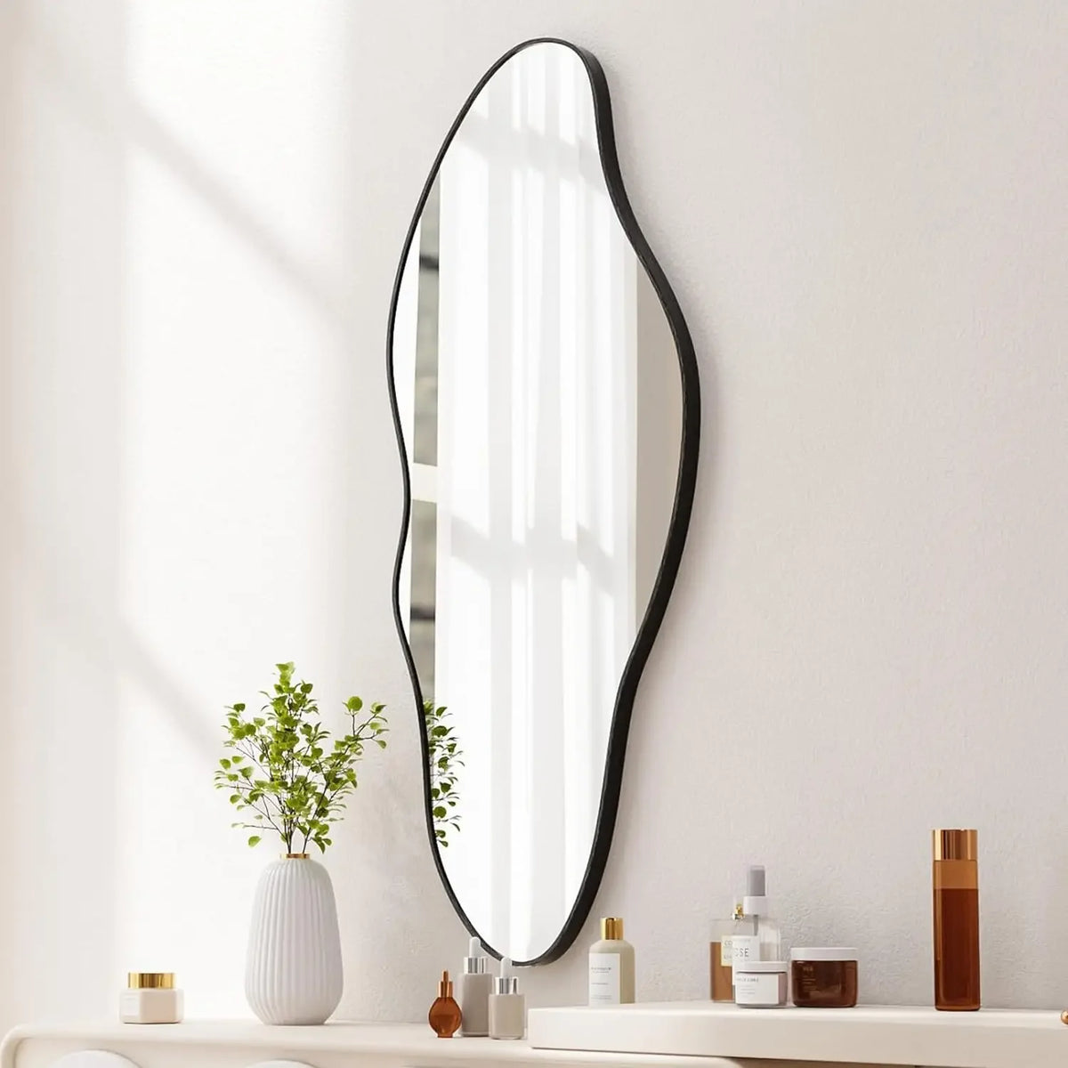 asymmetrical wall mirror with gold frame for interior decoration