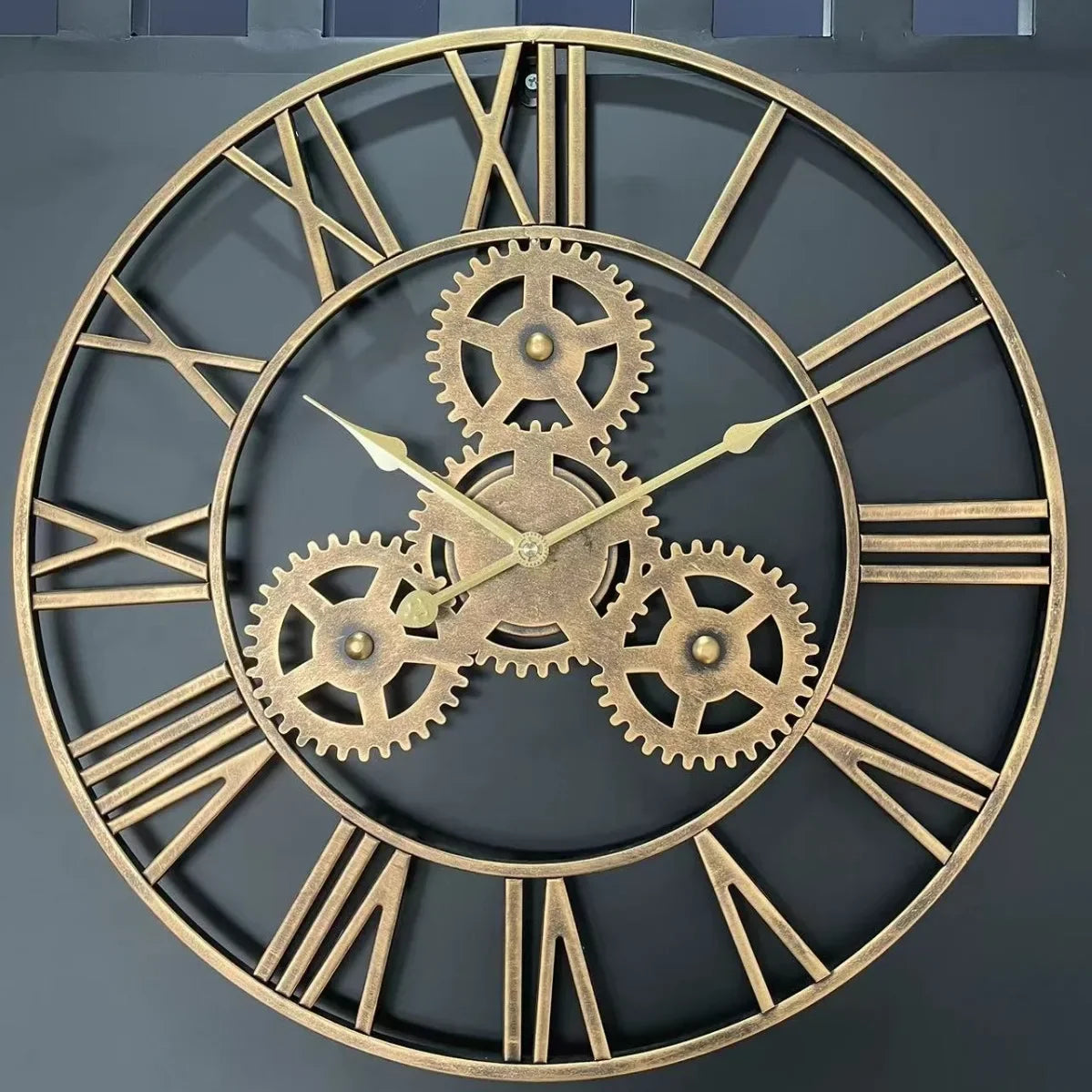 retro metal wall clock with large decorative gear
