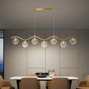 Modern glass and metal pendant light for interiors