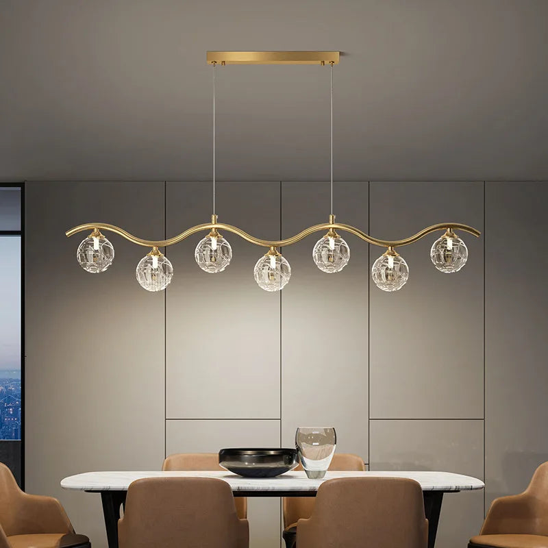 Modern glass and metal pendant light for interiors