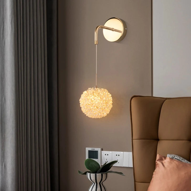 Elegant crystal and gold metal wall light for modern interiors