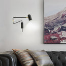 Industrial style adjustable wall light in black and gold