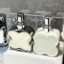 creative flower shaped ceramic bottle for gel and soap